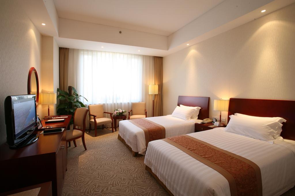 Kingswell Hotel Tongji Shanghai Værelse billede